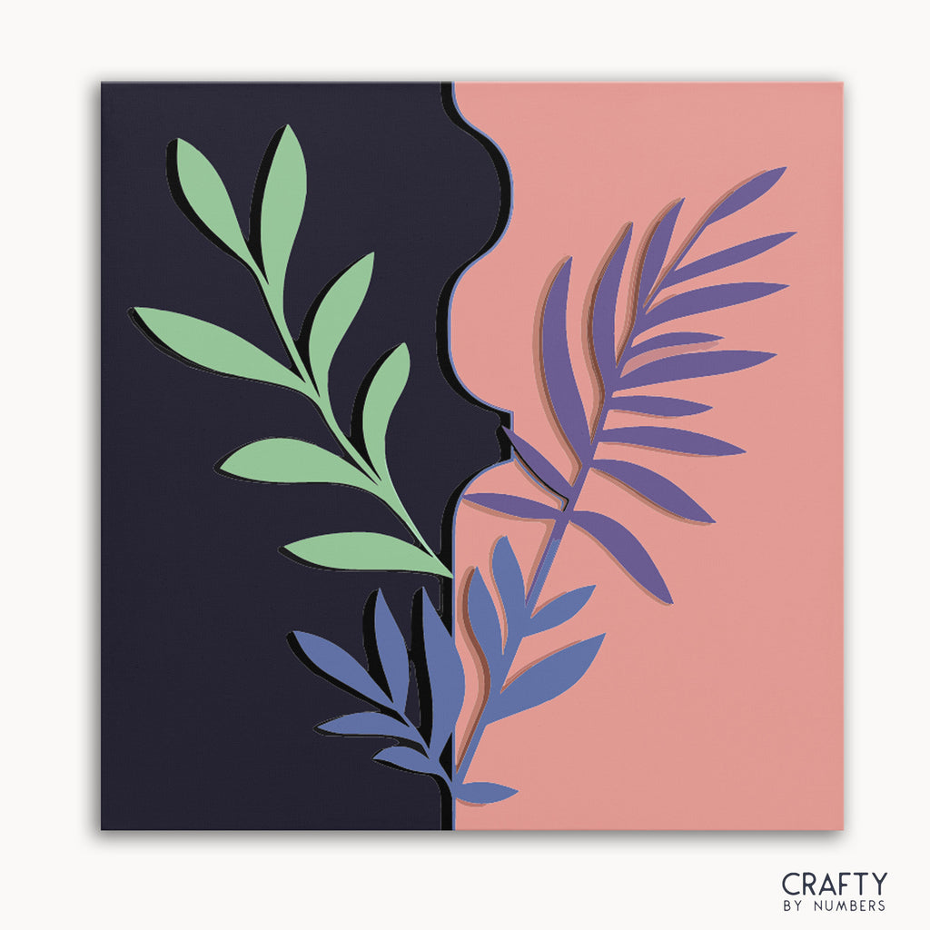 A paint by numbers kit with a design of stylized leaves on a dual-toned background, with a dark purple at the top and pink at the bottom.