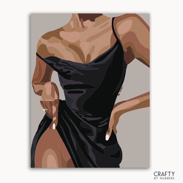A paint-by-numbers kit depicting a silhouette of a elegant figure in chic attire, with a 'Crafty by Numbers' logo in the bottom right corner.