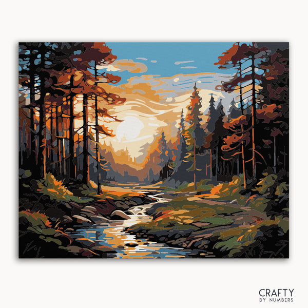 A paint by numbers kit depicting a forest scene with sunset in the background, including a stream and tall trees.