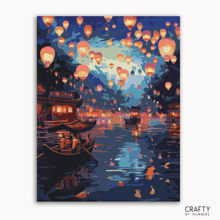 Un kit de pintura por números que representa una escena serena con linternas sobre el agua, con barcos y un puente al fondo.