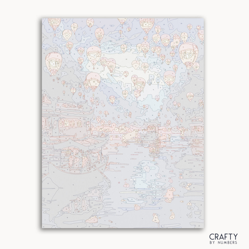 Paint by numbers kit featuring glowing lanterns floating on a calm river at night