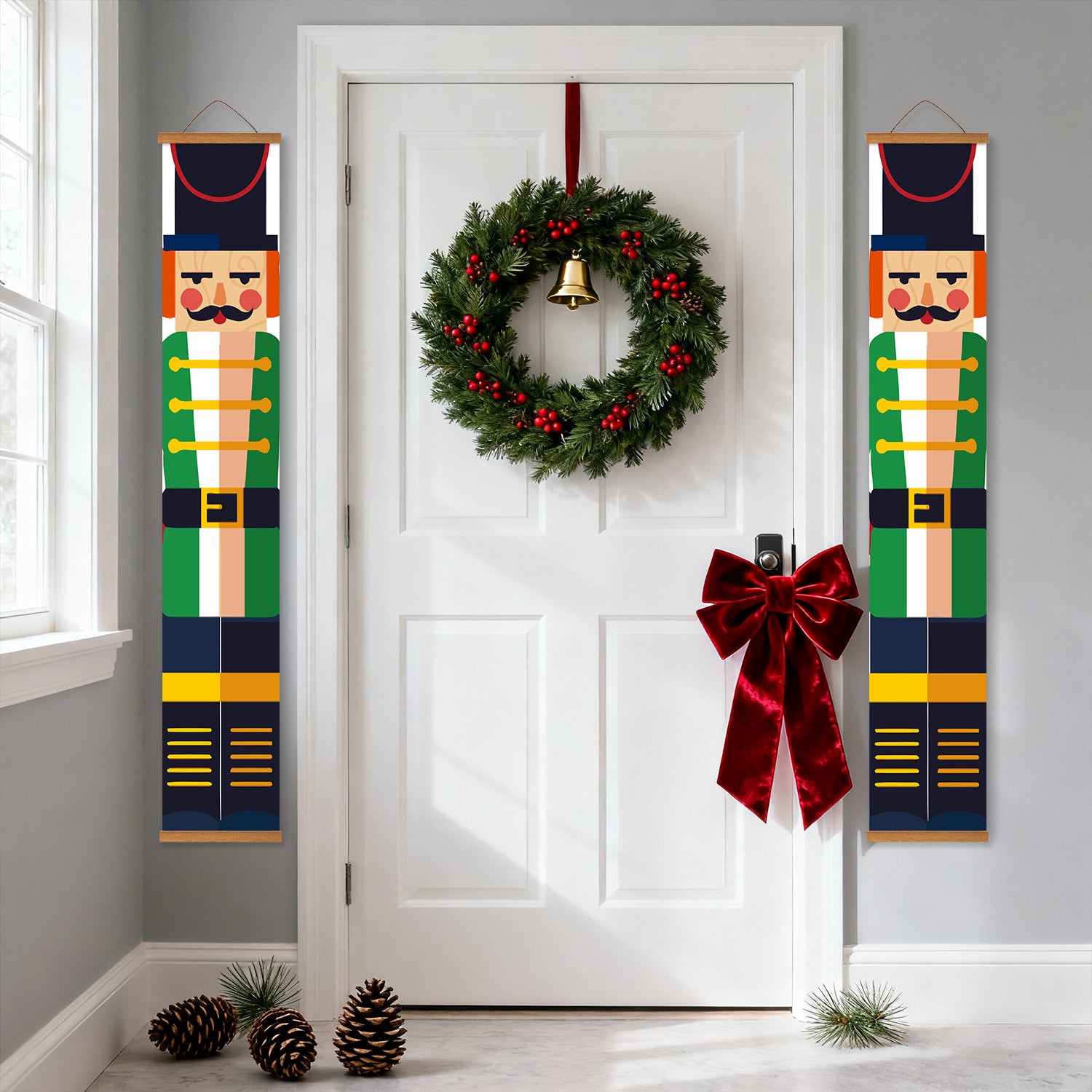 Decorative Christmas wreath with a red bow on a white door, flanked by two nutcracker banners.