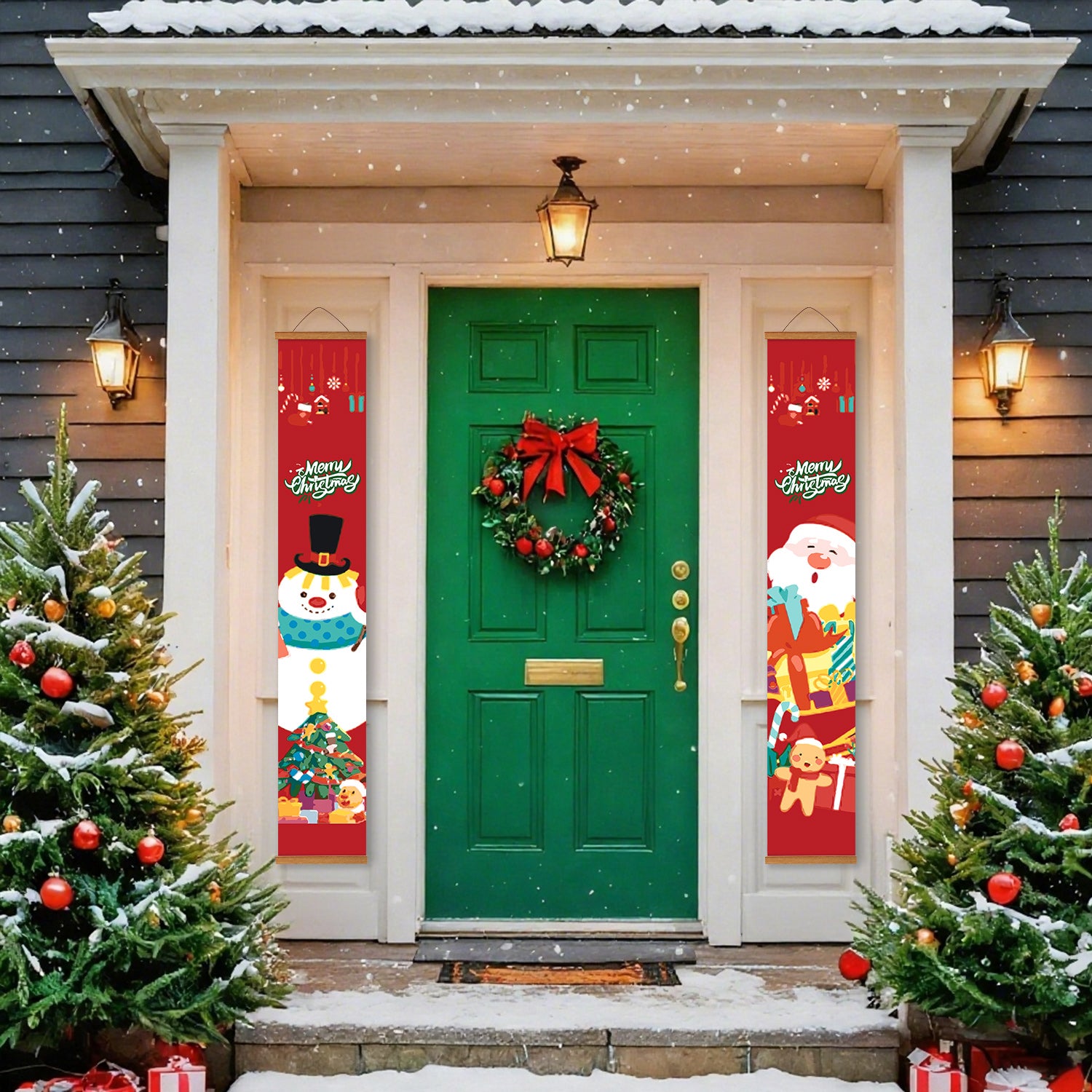 Decorative front door with Christmas wreath and banners, flanked by two Christmas trees on a snowy day.