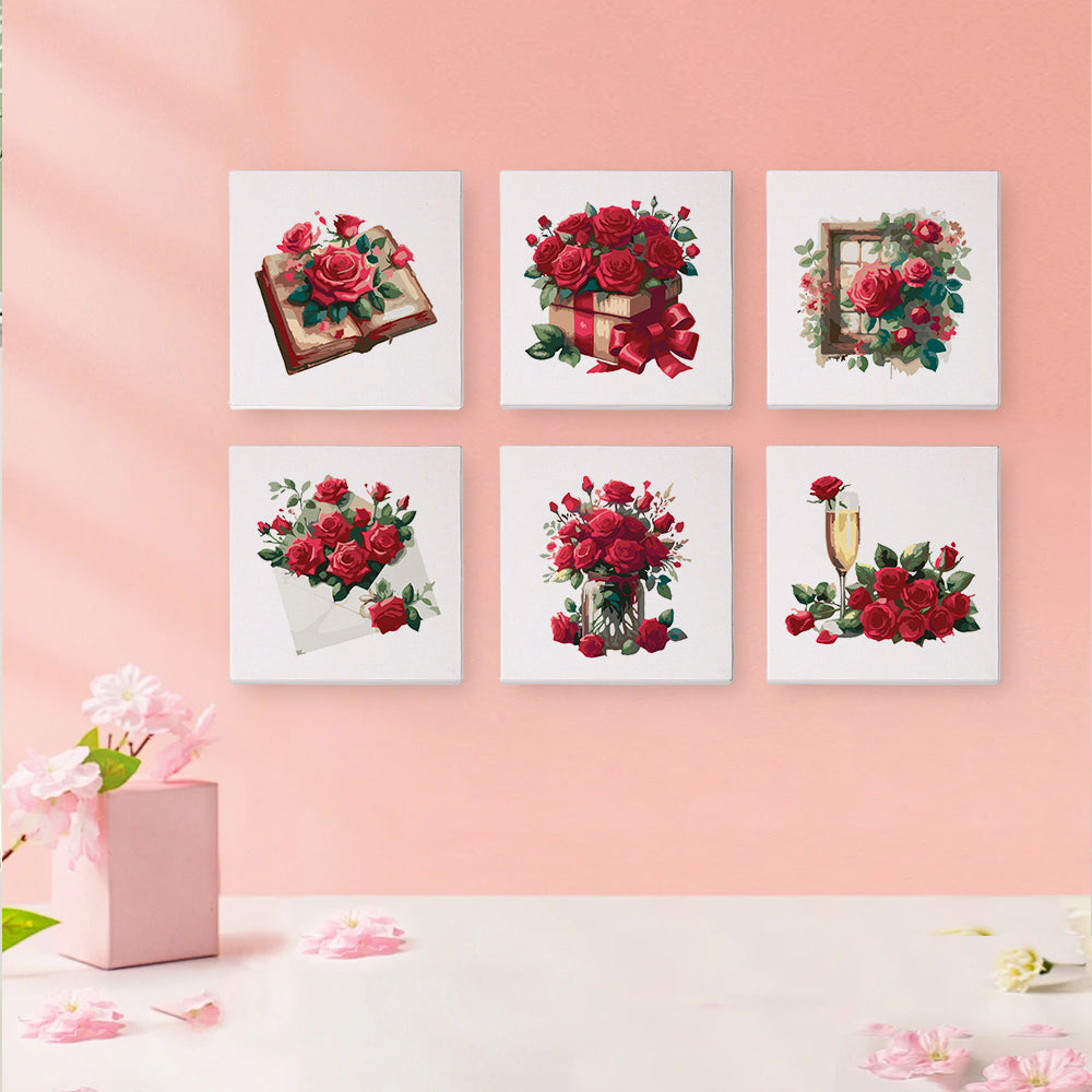 Person painting a rose section on Timeless Roses mini canvas