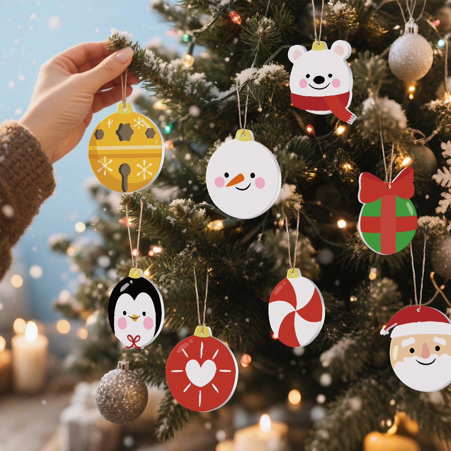 Hand placing a Christmas ornament on a decorated tree with other festive decorations.