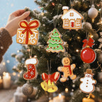 Decorative Christmas ornaments shaped like gingerbread cookies on a Christmas tree.
