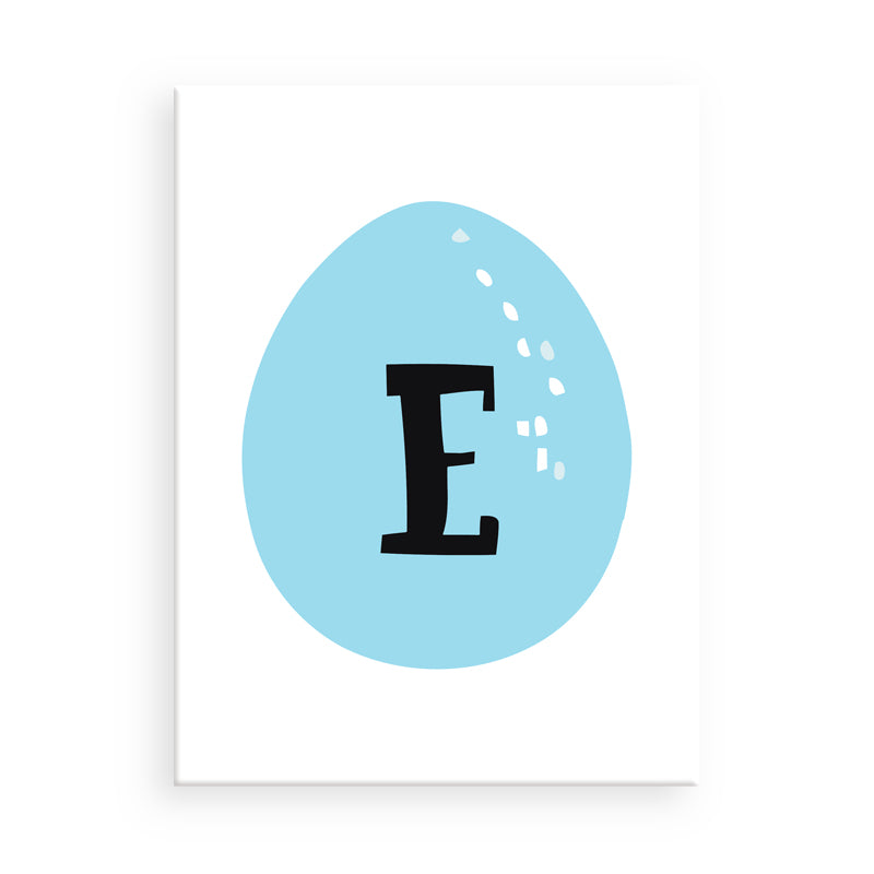 Blue Easter egg with the letter 'E' on a white background