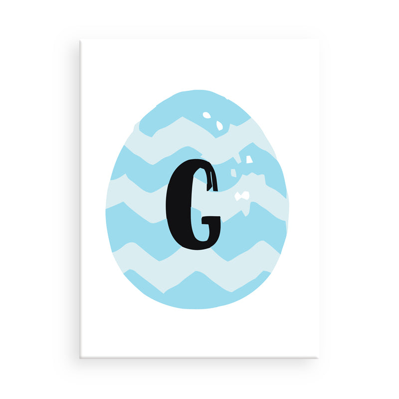 Rondell mit blauem Chevronmuster und schwarzem Buchstaben „G“ auf weißem Hintergrund