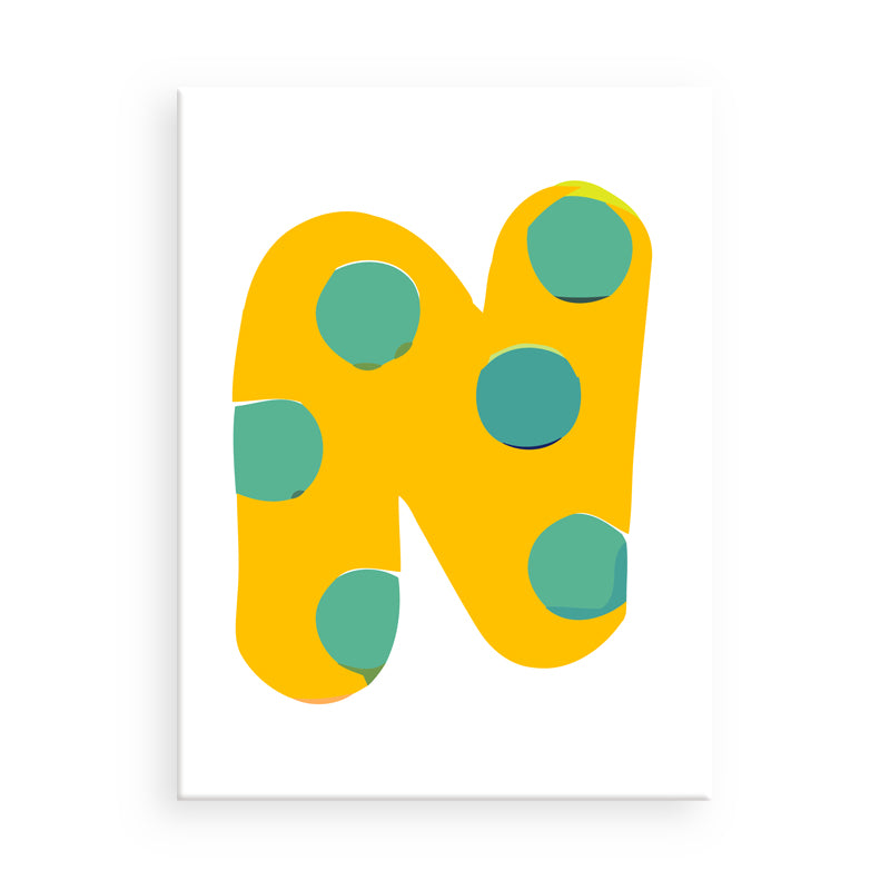 Yellow letter 'N' with green polka dots on a white background
