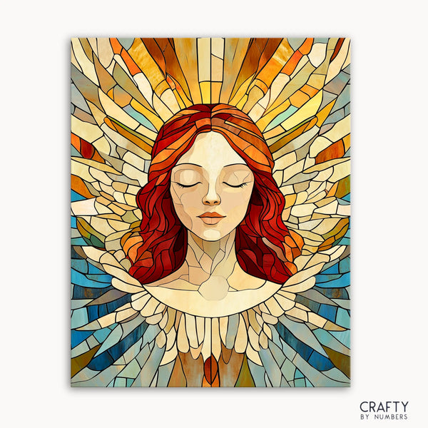 A paint by numbers kit image of an angel with closed eyes, depicted in a stained-glass style with vibrant colors and golden rays around the head.