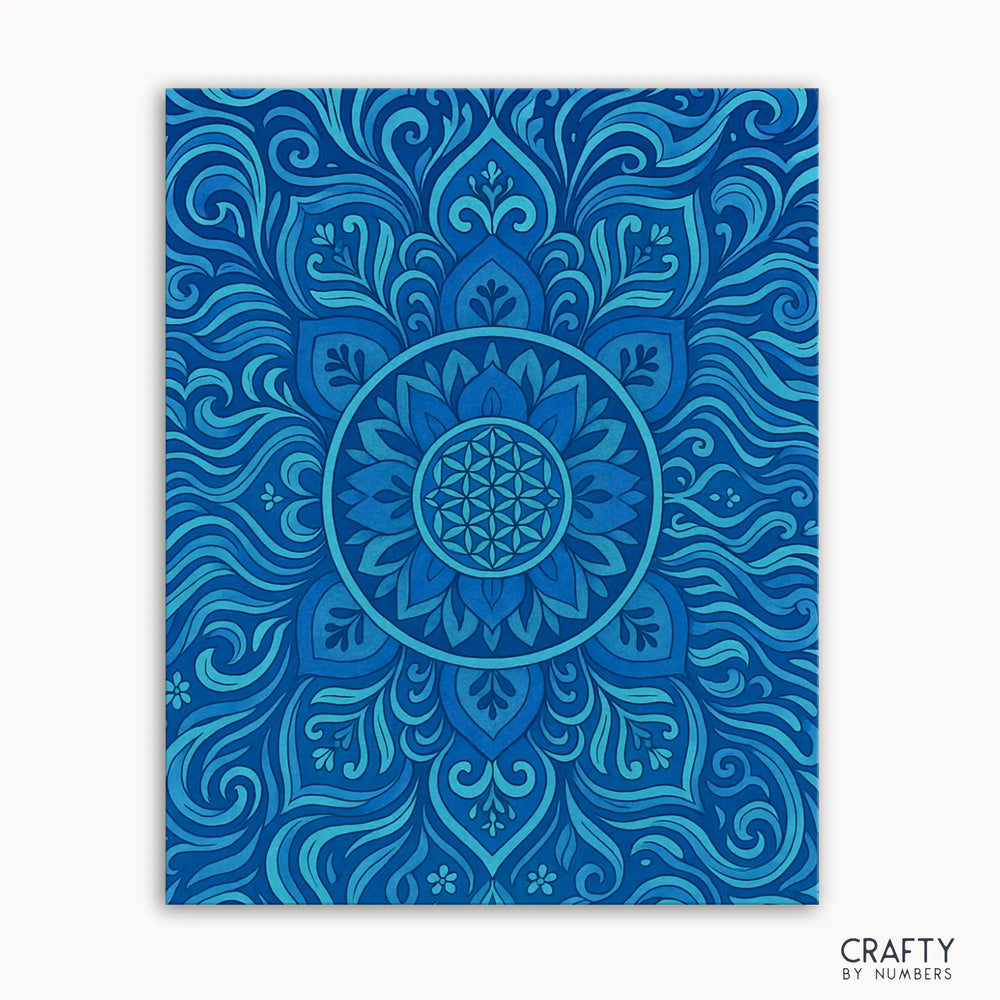 Aqua Aura Mandala Paint by Numbers kit featuring a serene mandala design with flowing curves and calming shades of blue and turquoise inspired by water and energy