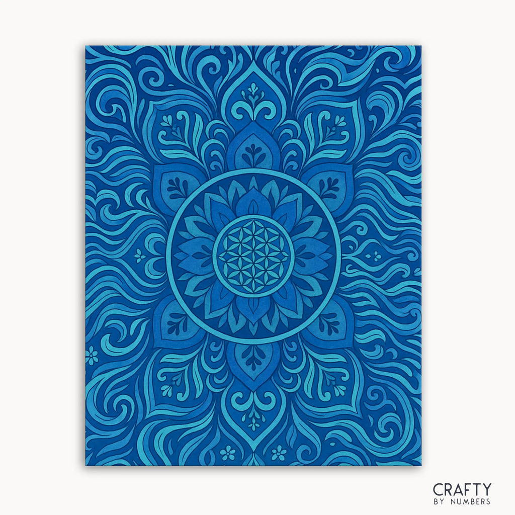 Aqua Aura Mandala Paint by Numbers kit featuring a serene mandala design with flowing curves and calming shades of blue and turquoise inspired by water and energy