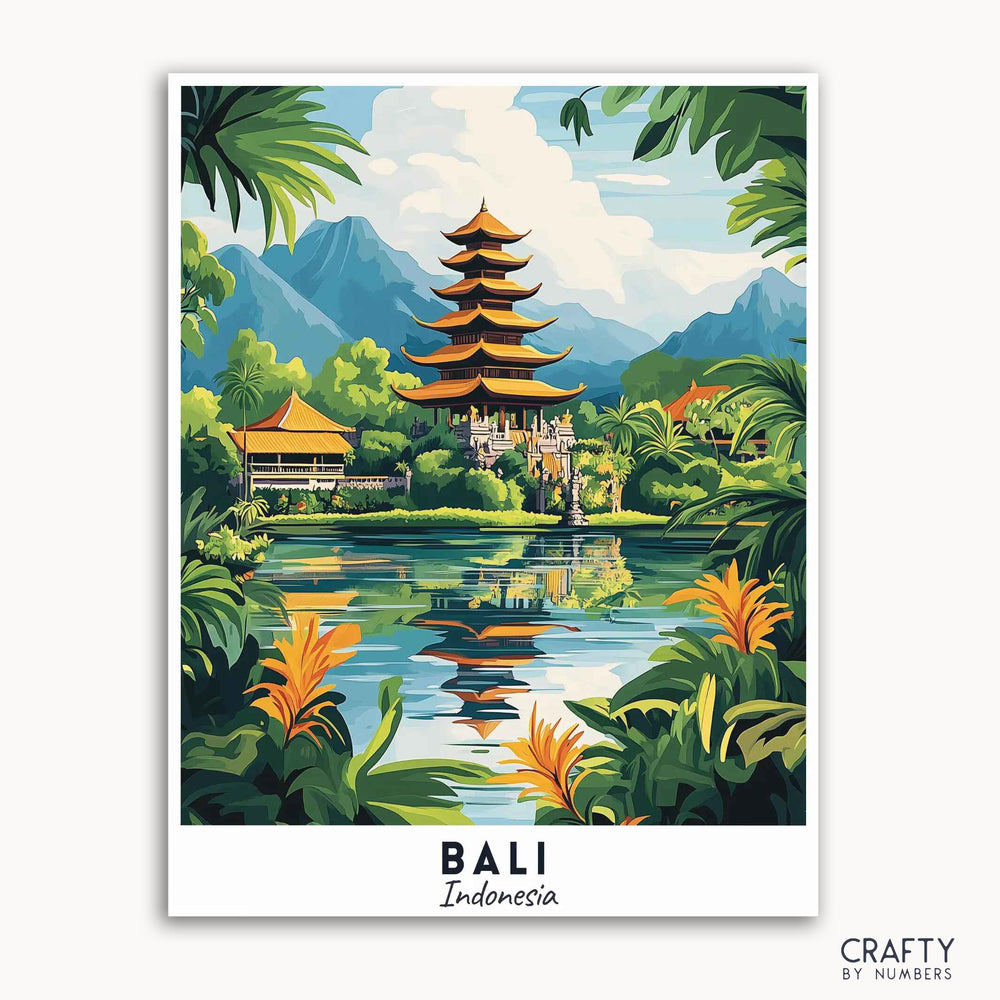 A paint by numbers kit depicting a travel poster of Bali, Indonesia with a temple, mountains, sky, trees, and water.