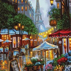 Best selling paint by numbers kit featuring a romantic Paris street with Eiffel Tower and warm lights