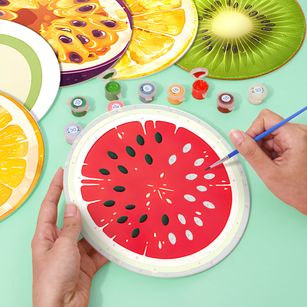 DIY canvas wall art kit with bright fruit designs, perfect for crafting and painting fun.