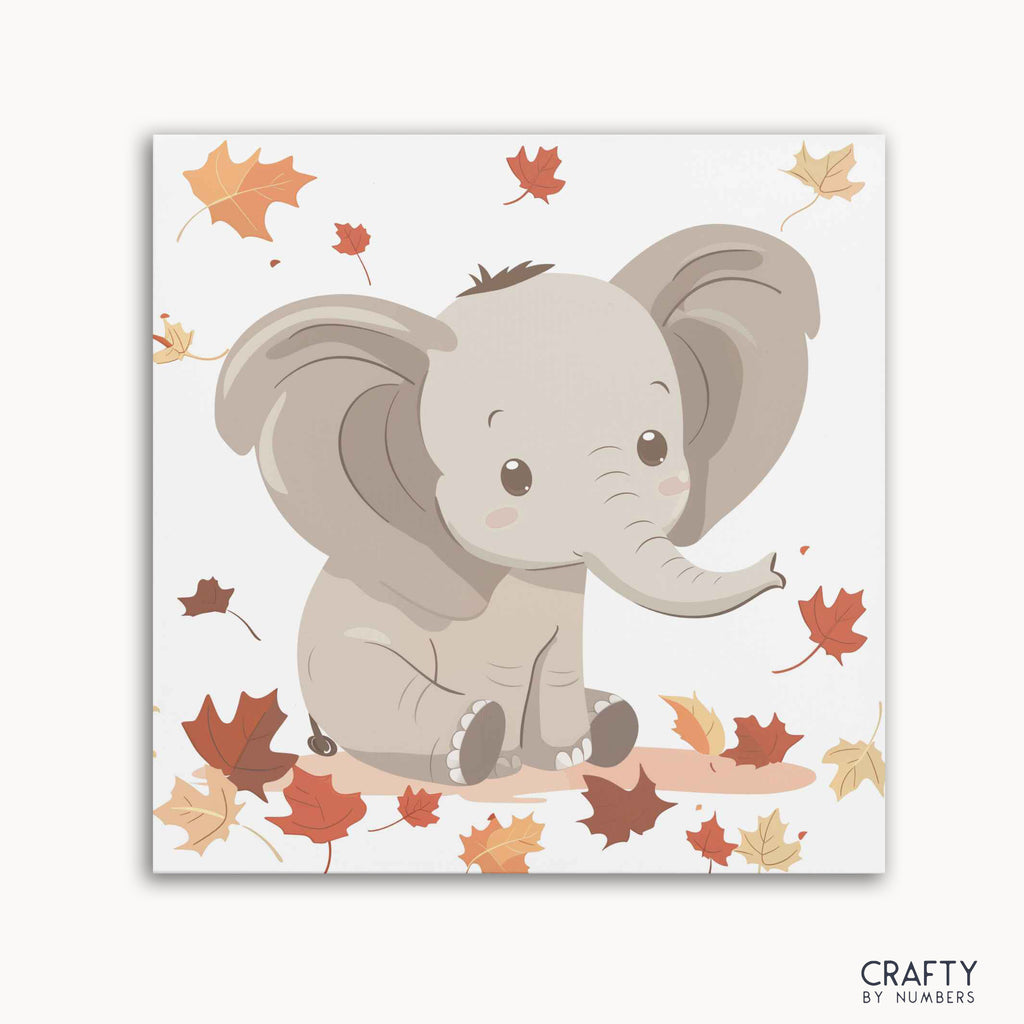 A paint by numbers kit featuring a cute elephant with autumn leaves around it, labeled 'Crafty by Numbers'.