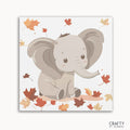 A paint by numbers kit featuring a cute elephant with autumn leaves around it, labeled 'Crafty by Numbers'.