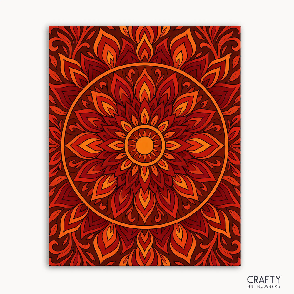 Mandala design with warm colors on a white background, featuring the brand 'Crafty by Numbers'.