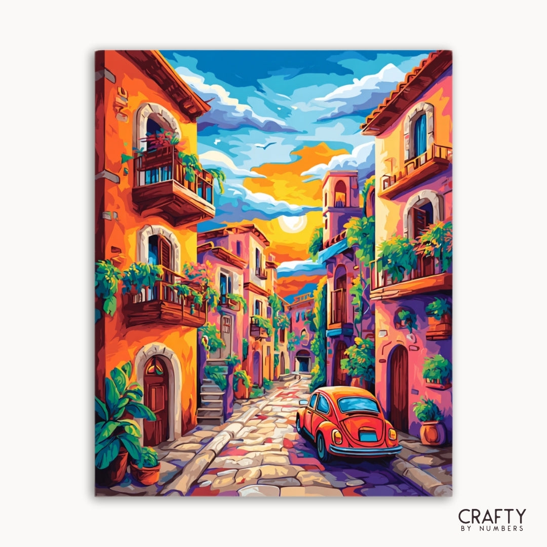 Buntes Gemälde einer Straßenszene mit Gebäuden und einem roten Auto, mit der Marke „Crafty by Numbers“.