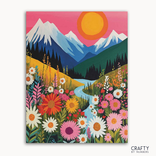 A paint-by-numbers kit canvas with a whimsical garden design, featuring vibrant flowers and a mountain range with a pink sky and sun.