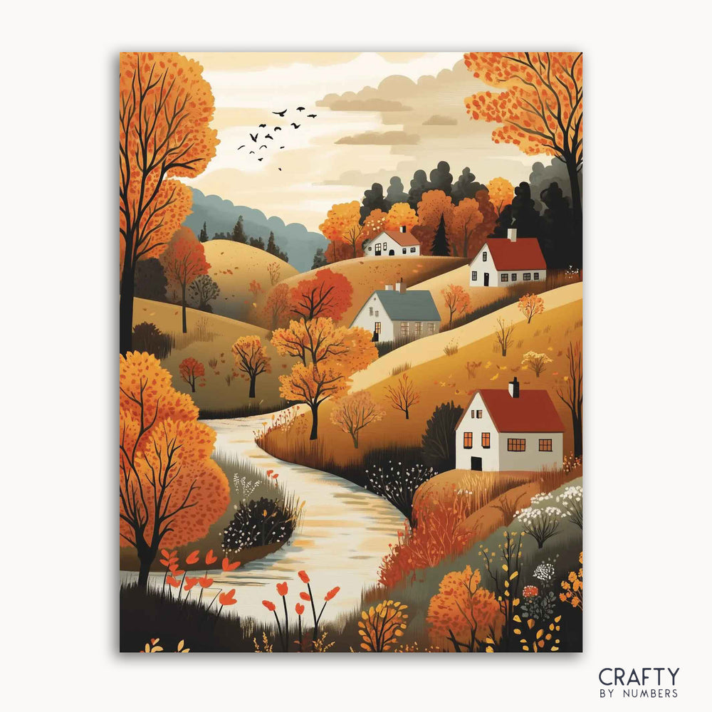 A paint-by-numbers kit depicting a village scene with autumn colors, including trees with orange leaves, a winding stream, and several houses.