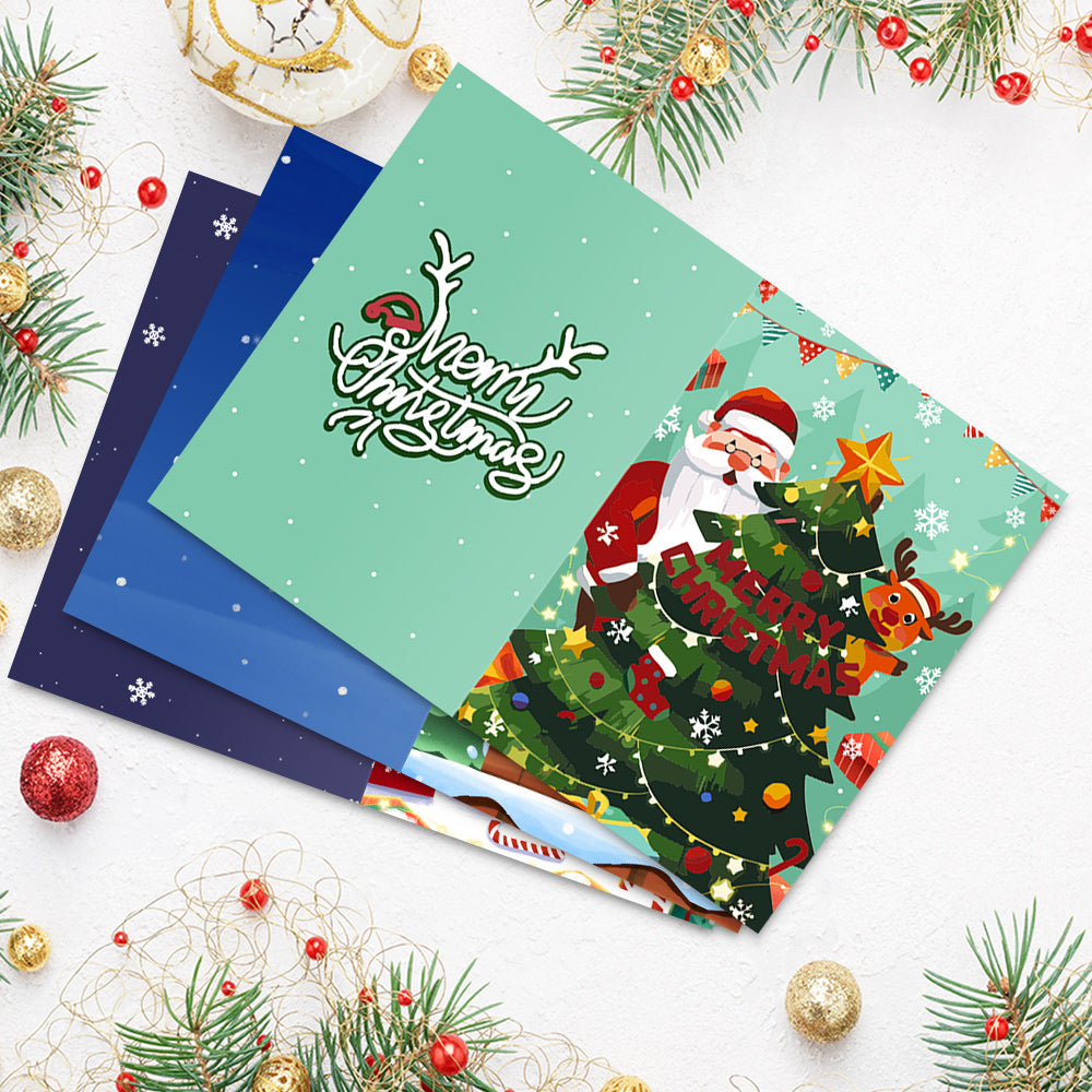 six cartes de vœux du Père Noël de Crafty avec une image du Père Noël dessus et disponibles en plusieurs couleurs