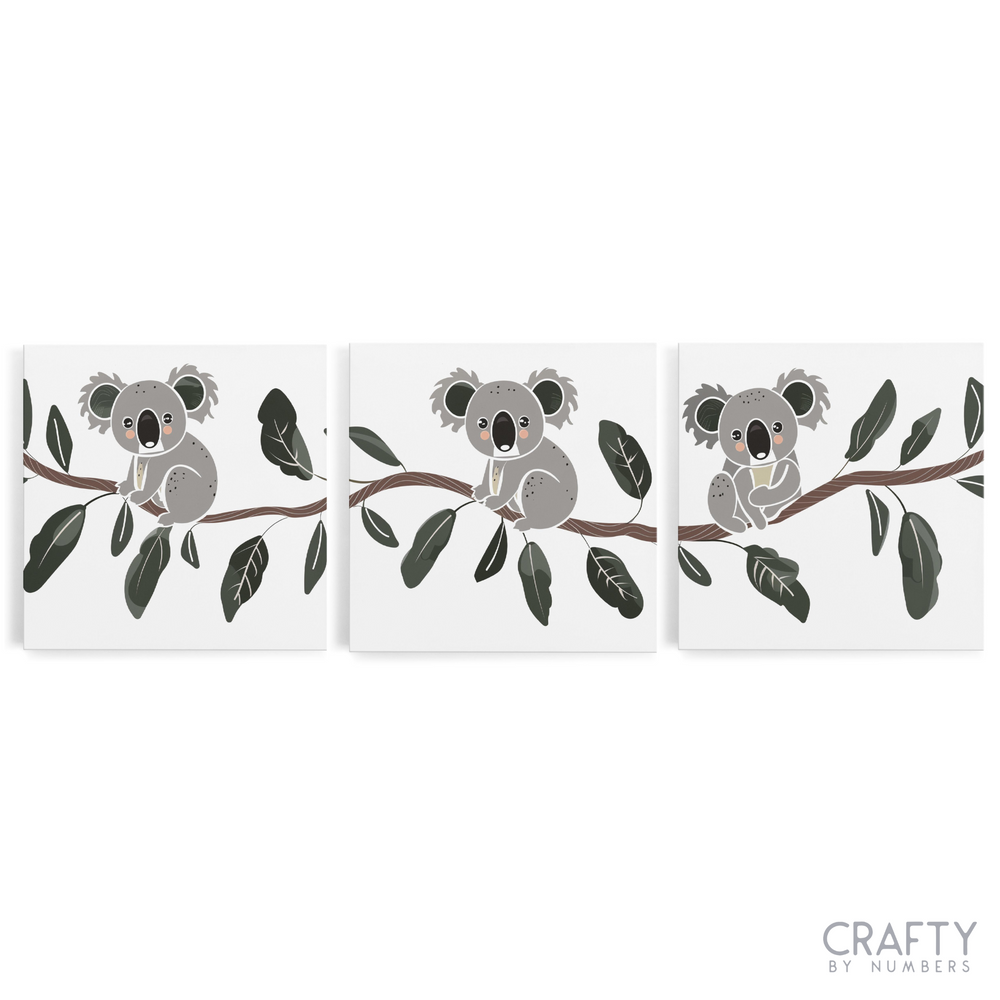 A set of three canvas paint by numbers kits with an koala animal design on each