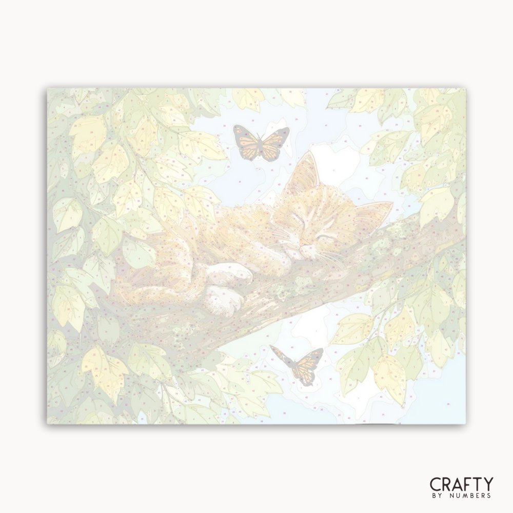 Illustration of a cat lying on a branch with butterflies in a nature-themed design, featuring the brand 'Crafty by Numbers'.