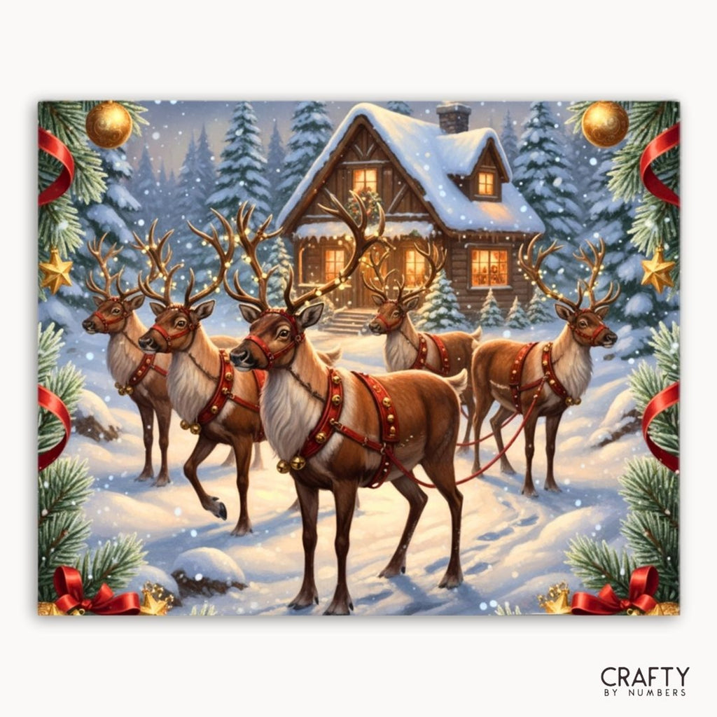 Harnessed reindeer outside a snow-covered woodland house, shown as a paint by numbers canvas.