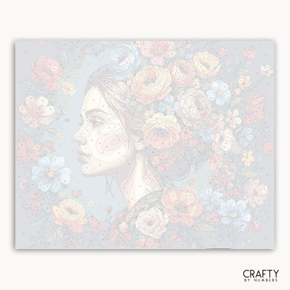 Artistic depiction of a woman's profile surrounded by flowers on a light blue background with 'Crafty by Numbers' branding.
