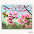 Painting of pink cherry blossoms on a branch with a blue sky background, brand 'Crafty by Numbers' visible.