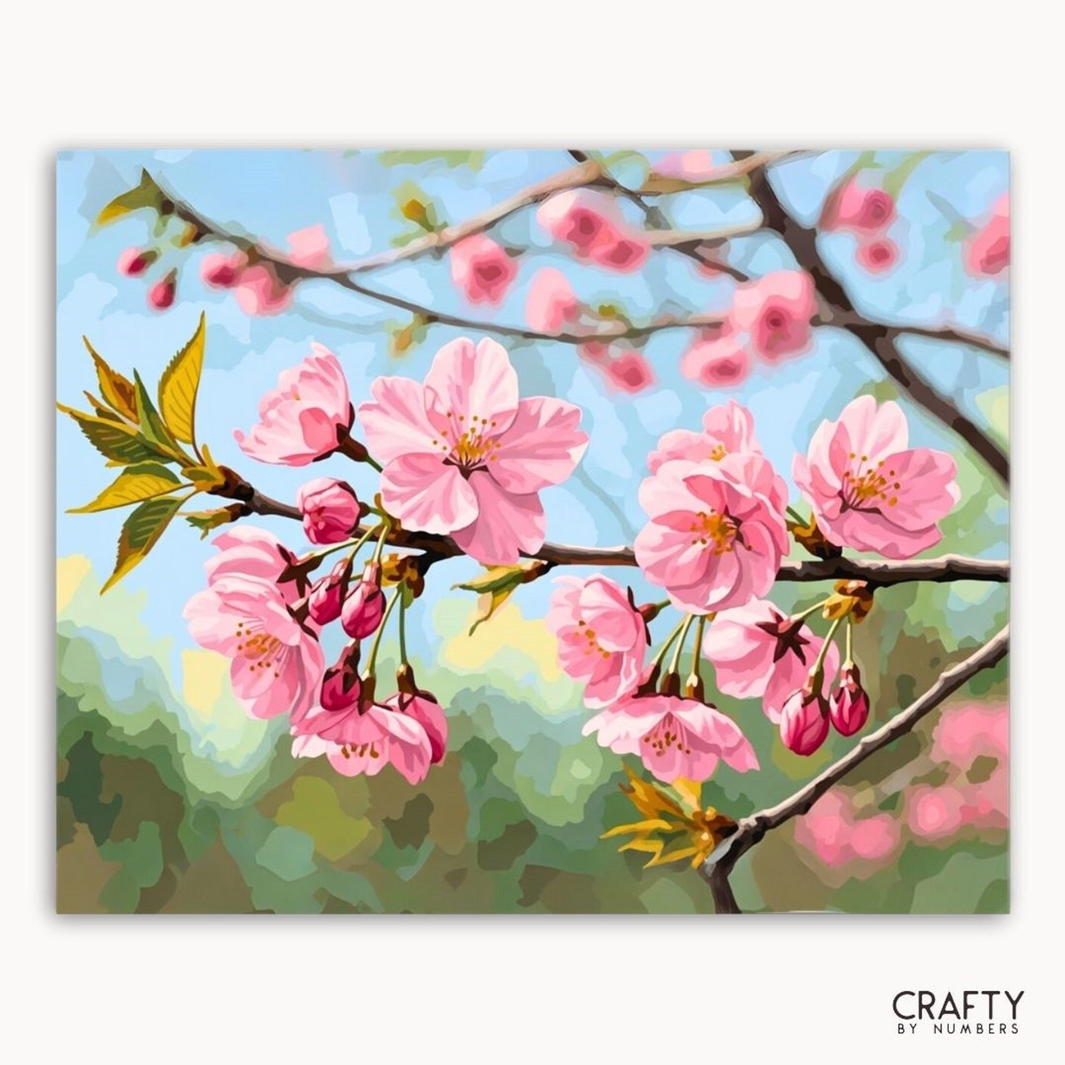 Painting of pink cherry blossoms on a branch with a blue sky background, brand 'Crafty by Numbers' visible.