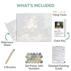 Artistic painting kit components including a canvas, reference sheet, brushes, paint set, color key, and detailed guide.