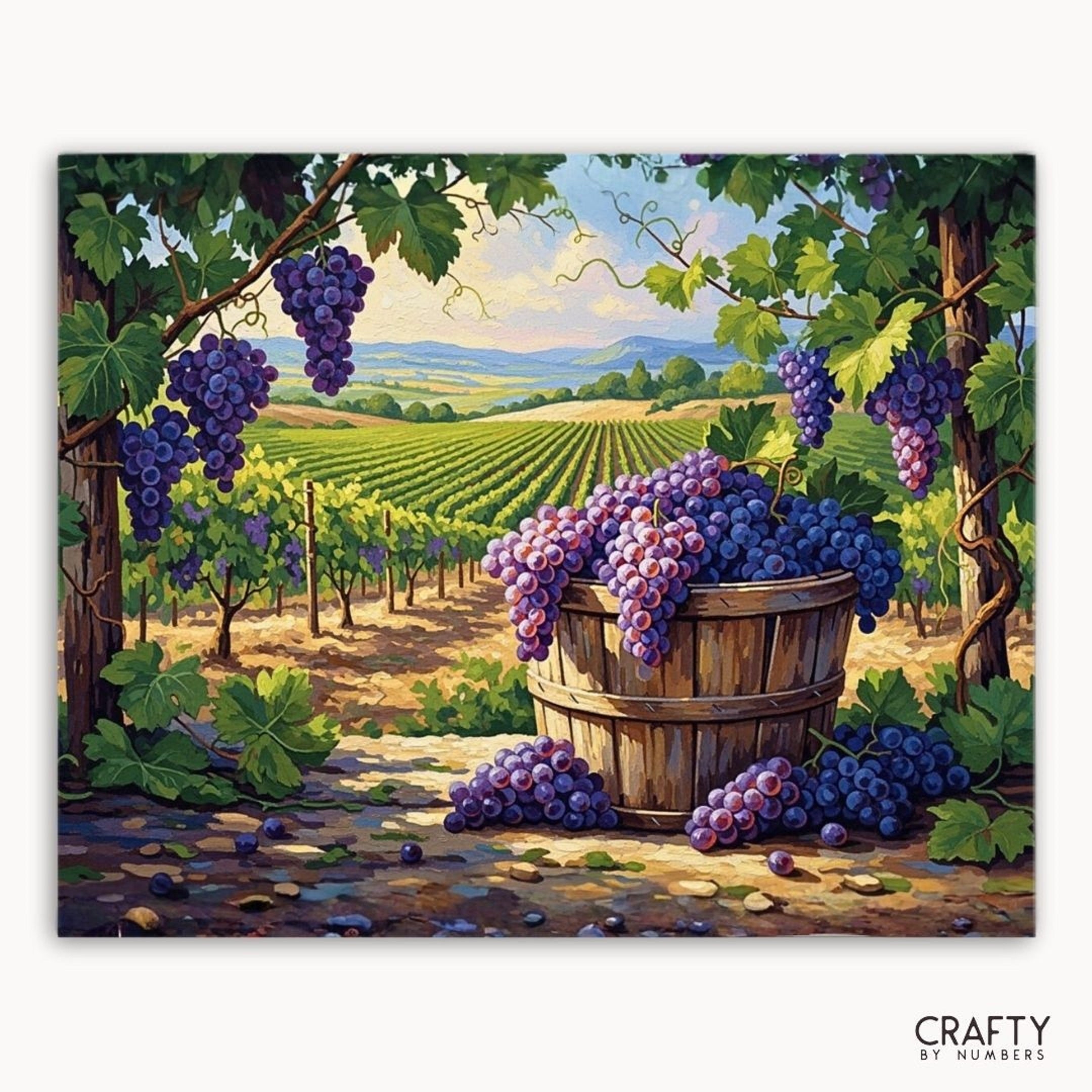 Painting of a vineyard with grapes and a wooden basket, featuring the brand 'Crafty by Numbers'.