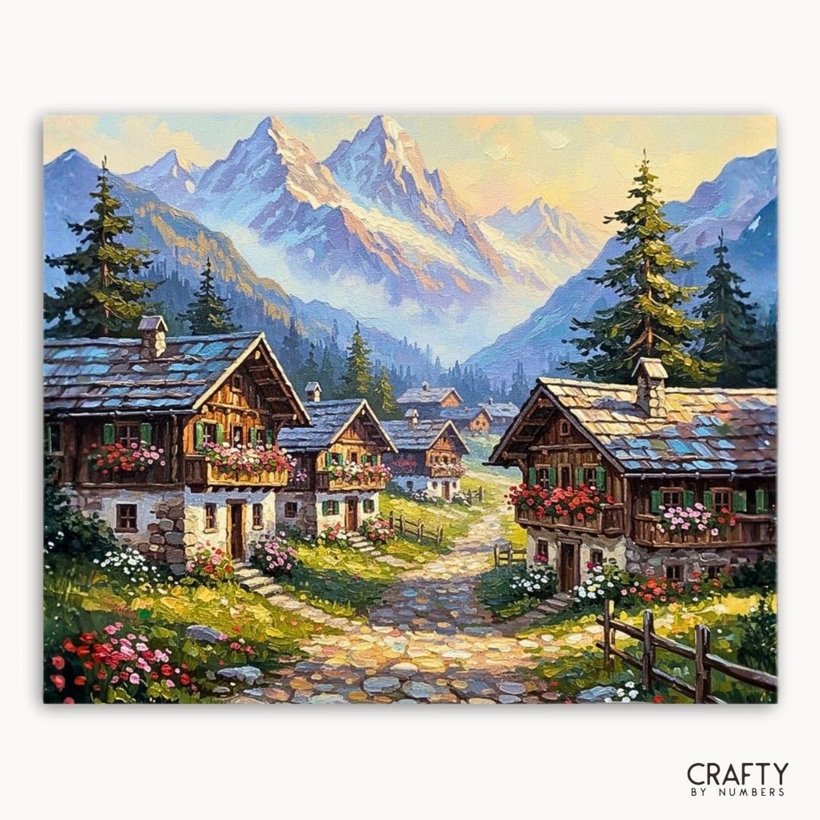 Gemälde eines Bergdorfes mit Holzhäusern und schneebedeckten Gipfeln, mit der Marke „Crafty by Numbers“.