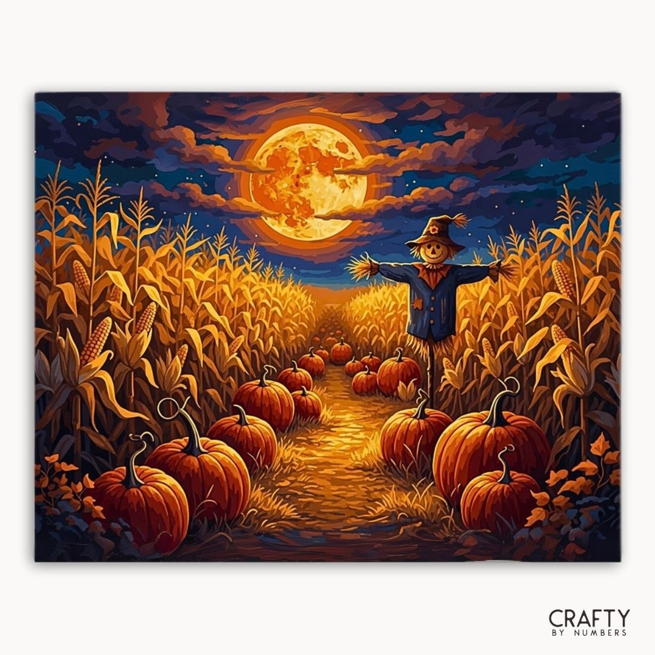 Scarecrow in a pumpkin patch with a full moon in the sky, featuring the brand 'Crafty by Numbers'.