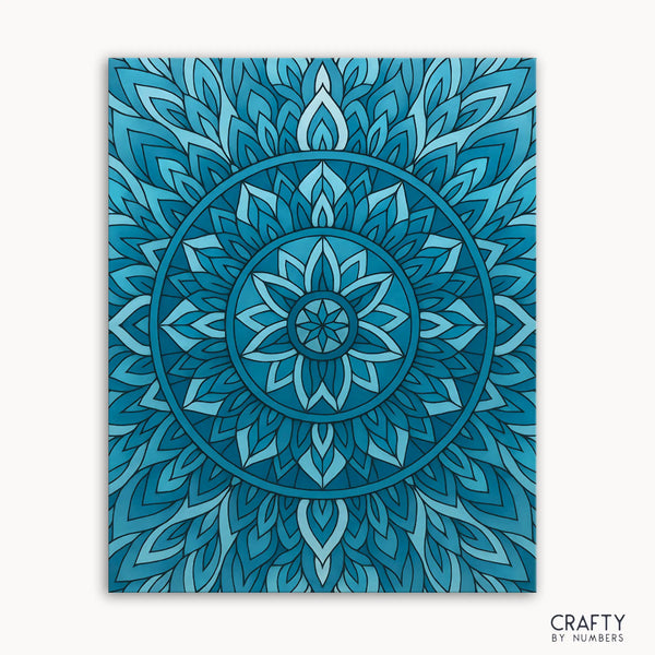 Ocean Mind Mandala Paint by Numbers kit featuring a tranquil mandala design with layered cool blues resembling waves of stillness in motion