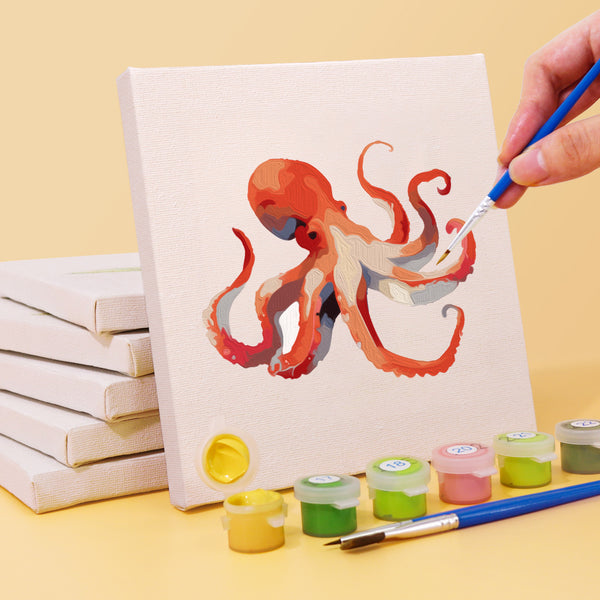 Mini painting kit featuring a coral reef under clear blue water