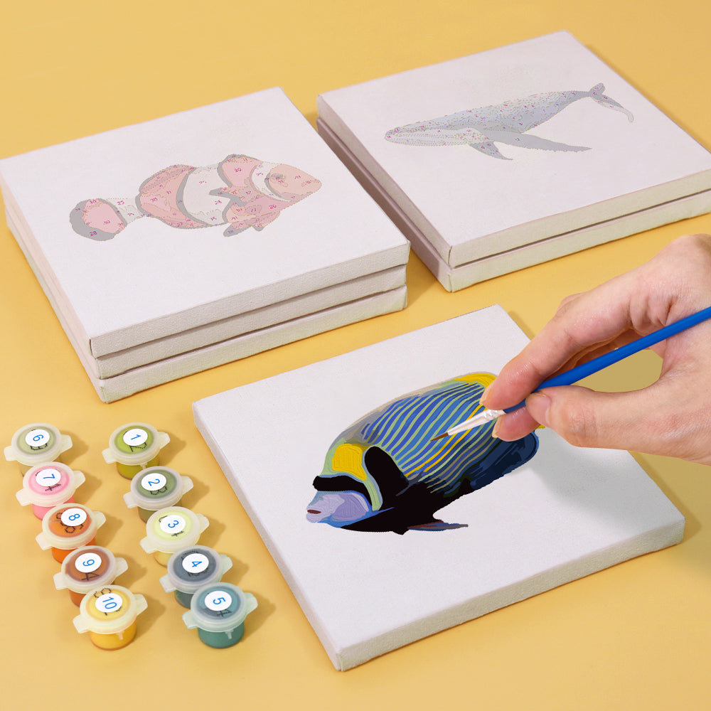 Ocean-themed paint by numbers kit with playful dolphins