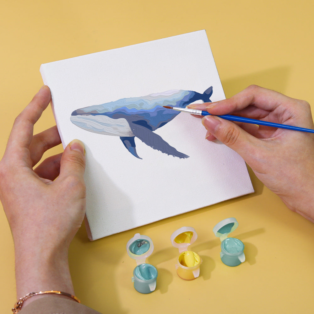 Hand painting a vibrant sea turtle with numbered guide