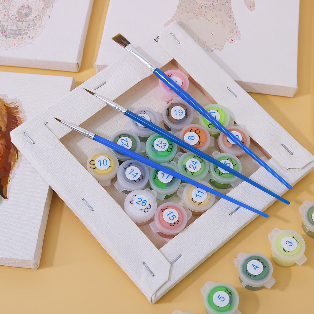 Mini canvas with numbers and outline of a playful kitten