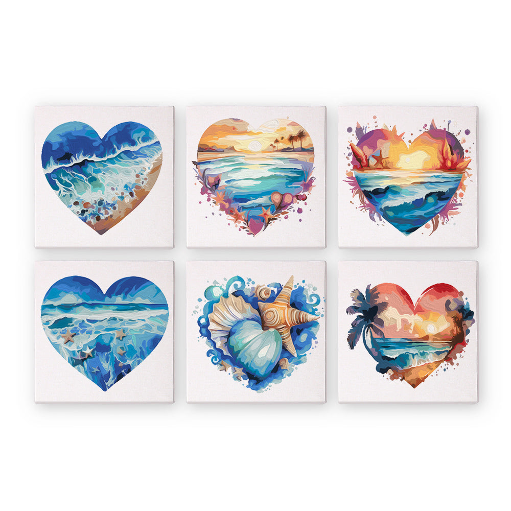 A set of six heart-shaped canvas paintings with ocean wave, sunset, and seashell motifs.