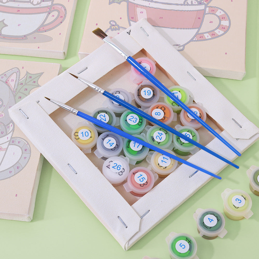 Mini canvas showing a playful cat in a decorative mug