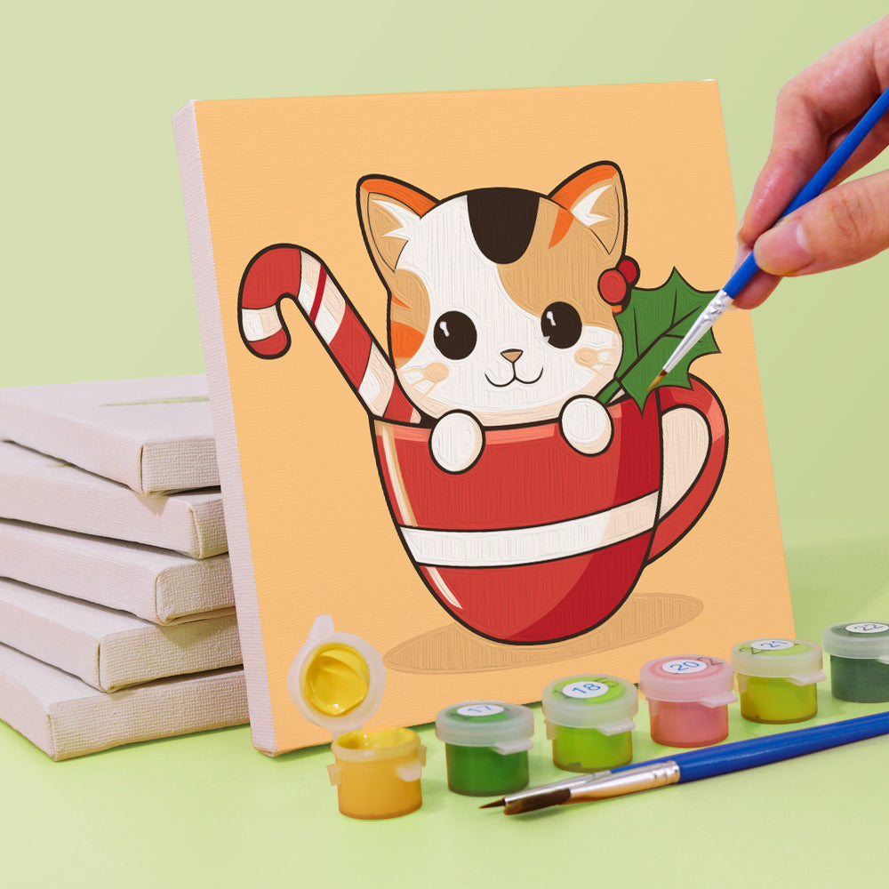 Mini paint by numbers canvas with a sleepy kitten in a mug