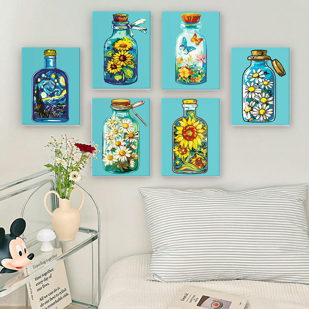 Artist painting Bottled Wonders Mini Paint by Numbers Kit on a cozy desk setup