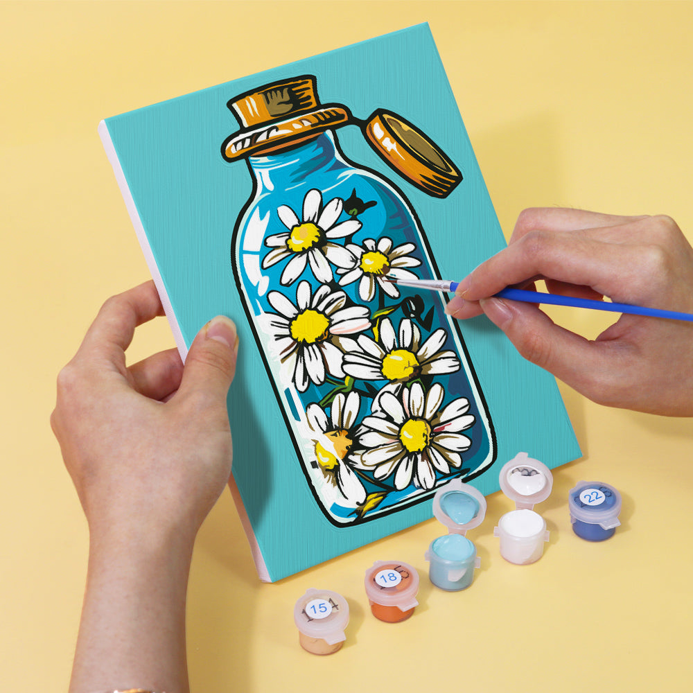 Close-up of a Bottled Wonders Mini Paint by Numbers Kit featuring a colorful ocean wave