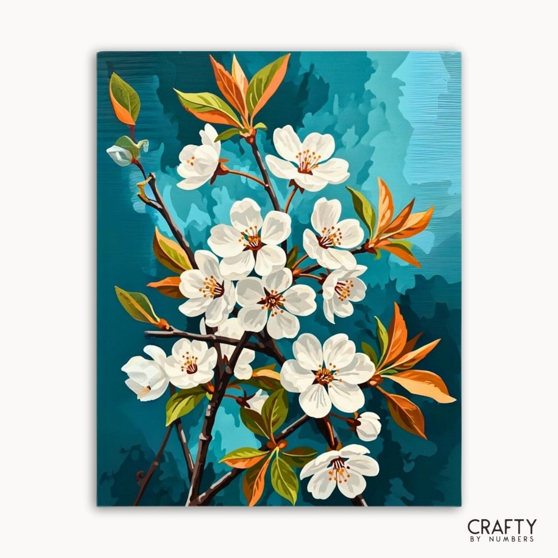 Painting of white flowers with orange and green leaves on a blue background, brand 'Crafty by Numbers' visible.