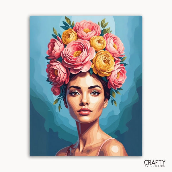 Artistic depiction of a woman with flowers on her head against a blue background, with 'Crafty by Numbers' branding.
