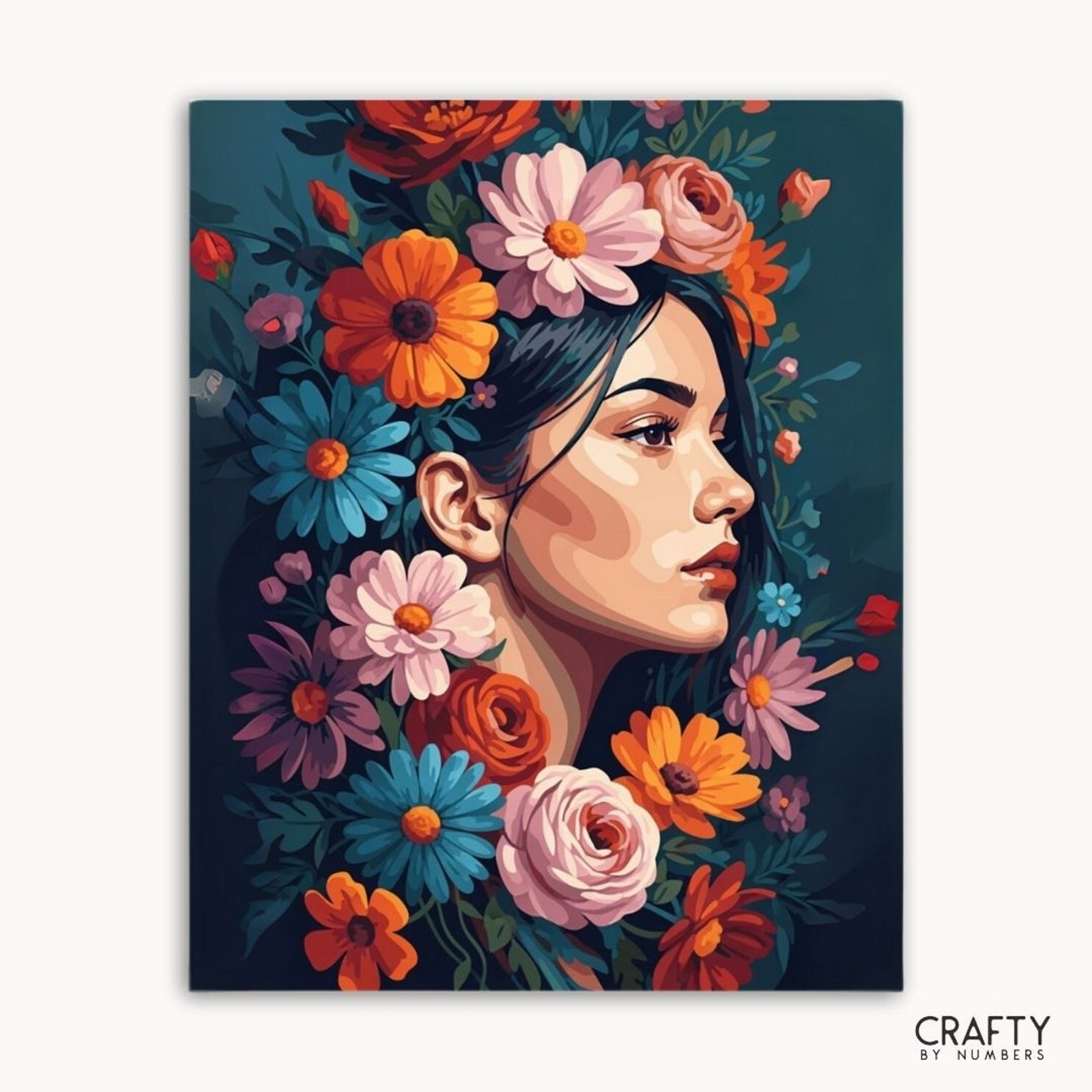 Künstlerische Darstellung des Gesichts einer Frau, umgeben von bunten Blumen, mit „Crafty by Numbers“-Branding.