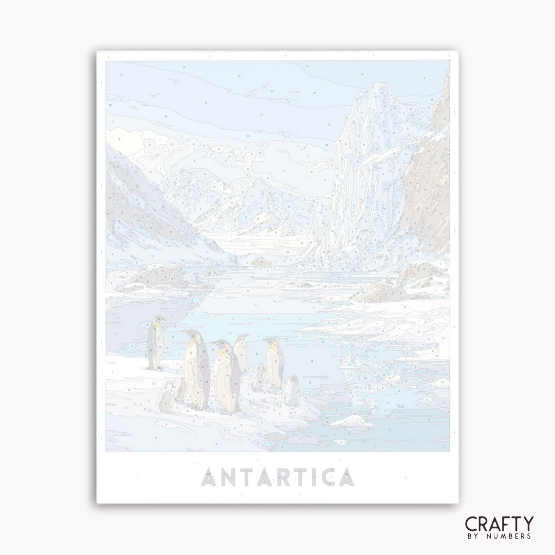 Illustration of penguins on an Antarctic landscape with 'ANTARCTICA' text and 'Crafty by Numbers' branding.